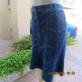 As new knee length denim skirt with 10 panels size 38/14. Zip on front. In polycotton stretch fabric