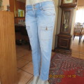 Sexy light blue denim jeans size 34/10 by FASHION EXPRESS. Skinny legs.Low rise.Good cond.