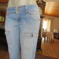 Sexy light blue denim jeans size 34/10 by FASHION EXPRESS. Skinny legs.Low rise.Good cond.