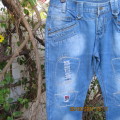 Men`s fashion blue distressed jeans with unique pockets galore size 34 by COSITA.Good condition.