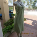 Go feminine in this apple green strappy fully lined dress.Size 36/12 by DEFINE.In linen/cotton blend