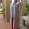 Free falling white linen coat/long jacket with tiny cut-on sleeves. By LEONIE in size 38 to 40.