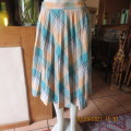 Check-mate ! Size 38/14 A TERSEL GARMENT.Concertina pleated jade/cream check.Polyester.