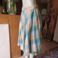 Check-mate ! Size 38/14 A TERSEL GARMENT.Concertina pleated jade/cream check.Polyester.