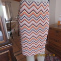 Must have bodycon skirt in peach ,pink , purple and cream zig-zag pattern. Size 38 to 40 by AMARA.
