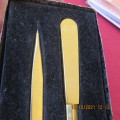 NEDBANK gift set containing a letter opener and pen in gold tone. As new.