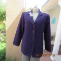 Smart boutique made purple long sleeve jacket.Four button closure with cloverleaf collar.Size 36.
