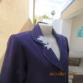 Smart boutique made purple long sleeve jacket.Four button closure with cloverleaf collar.Size 36.
