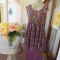 Cool sleeveless dull purple sheer creased polyester empire style top.Size 42/18.Pretty floral design