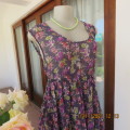 Cool sleeveless dull purple sheer creased polyester empire style top.Size 42/18.Pretty floral design