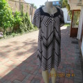 Stunning new short sleeve monochrome empire waist dress in soft silky 2 layer polyester.Size 32/8