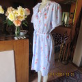 As new 80`s vintage dress by FOSHINI size 46/22.Light blue with crimson flowers.Frilled V neckline