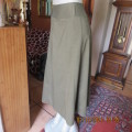 Stunning dark olive A Line skirt with 14 panels by MILADY`S size 34 to 36. Polyester/rayon fabric.