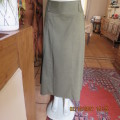 Stunning dark olive A Line skirt with 14 panels by MILADY`S size 34 to 36. Polyester/rayon fabric.