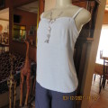 Powder blue empire style strappy top size 34/10 loose fit top in polyester satin.Owner made.As new