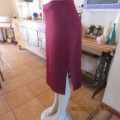 Maroon heavy stretch 100% polyester pencil skirt with slits at sides.Size 36/12 by MASSUMI.As new.