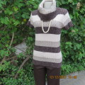 Knitted poloneck top in wide brown and cream horizontal lines. Acrylic yarn.Rib stich. Size 36 to 38