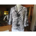 Amazing broken diagonal striped top/jacket size 36/12 in grey/white/black.Black sheer edging,New con