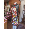 Ethnic look cream dress with bold autumn design.Black long sheer sleeves and yoke.Size 36 by ENVY.