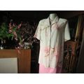 Beautiful short sleeve pale pink button down top with rosepink/light brown lilies.Size 40 by FOSHINI