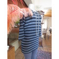 Sexy long horzontal striped winter top in grey/black.Long sleeves and low back.Size 36/12. As new