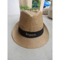 Men`s paper rattan fedora style hat size 58cm. Black band with SEDGWICK`S logo.New condition