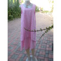 As new ALABASTER pink dress in 2 shades.Loose hanging in 2 layers/lengths.Size 38/14.