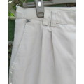Men`s high quality DOW JONES and CO beige pants size 36. 100% cotton chino.Pleats on front.As new