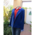 Royal blue short modern long sleeve jacket closing with 1 button. By FASHION EXPRESS. Size 38.As new