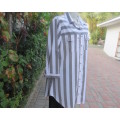 Fabulous extra long top/shirt in grey/white vertical stripes. Yoked. Elbow length sleeves.Size 40/16