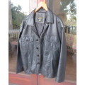 Genuine leather black Men`s jacket authentic original design.By HUSKY size 2XL.Pockets galore.As new