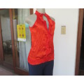 Sweet red silky creased blouson sleeveless top.Wide elasticated seamline.Size 30/6 by IQ.New cond.