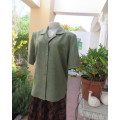 Avo green box style short sleeve Boutique made top with button down and open collar.Size 44/20.