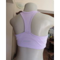 Soft lilac sports bra size 32 by MAXED in stretch polyester fabric. As new