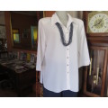 Classic white button down blouse with open collar and elbow length sleeves.Size 40/16.WOOLWORTHS