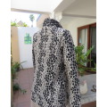 Amazing cream/black shiny animal print zip up new top in silk/poly opaque fabric.Size 34/10