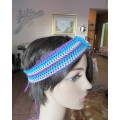 Pretty crochet acrylic hairband in purple/grey/blue stripes with flower.Purple braiding ties at back