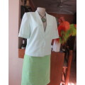 Gorgeous mint green cropped short sleeve jacket/top. Close with 2 buttons.Fully lined.Size 34/10.