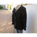 High fashion black long sleeve warm padded jacket size 32 to 34 by MATMAZELI. Faux fur collar/fronts
