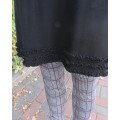 Irresistible black viscose stretch long top/short dress in 32/8 Capped sleeves.Frilled neck/hemline