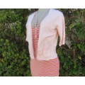 Charming champagne pink acrylic/nylon/cotton knitted button down cardigan.By TAKE OUT size 36/12.