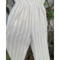 Sexy striped jumpsuit in cream and white size 30/6.Elasticated waist.V neck with thin straps.As new.