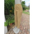 Golden wheat colour suede look polyester dress pants size 34/10. No stretch.Owner made.Very good con