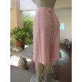 Elegant light pink/black vertical stripe pencil skirt in poly/linen blend. Size 33/9 .Zip at back.
