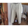 Men`s best quality beige size 48 pants.STERLING in trevira/cotton. Pockets sides 1 back.As new