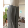 Versatile pickle green dress pants with wide legs.Little tapering.Size zip.By FOSHINI size 40/16.