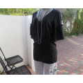 Adorable black/white vertical striped viscose top.V neck.Frilled sleeves.Size 32/8 by EDITION.As new