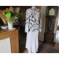 Amazing cross over high neck white/pink/grey floral long sleeve top.Size 42/18 By MILADY`S. As new.