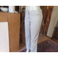 High quality ecru colour cotton stretch ankle length pants in size 36/12 by STUDIO W.New condition.