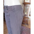 As new black/brown vertical striped stretch cotton pants size 40/16. Side pockets, dummies at back.